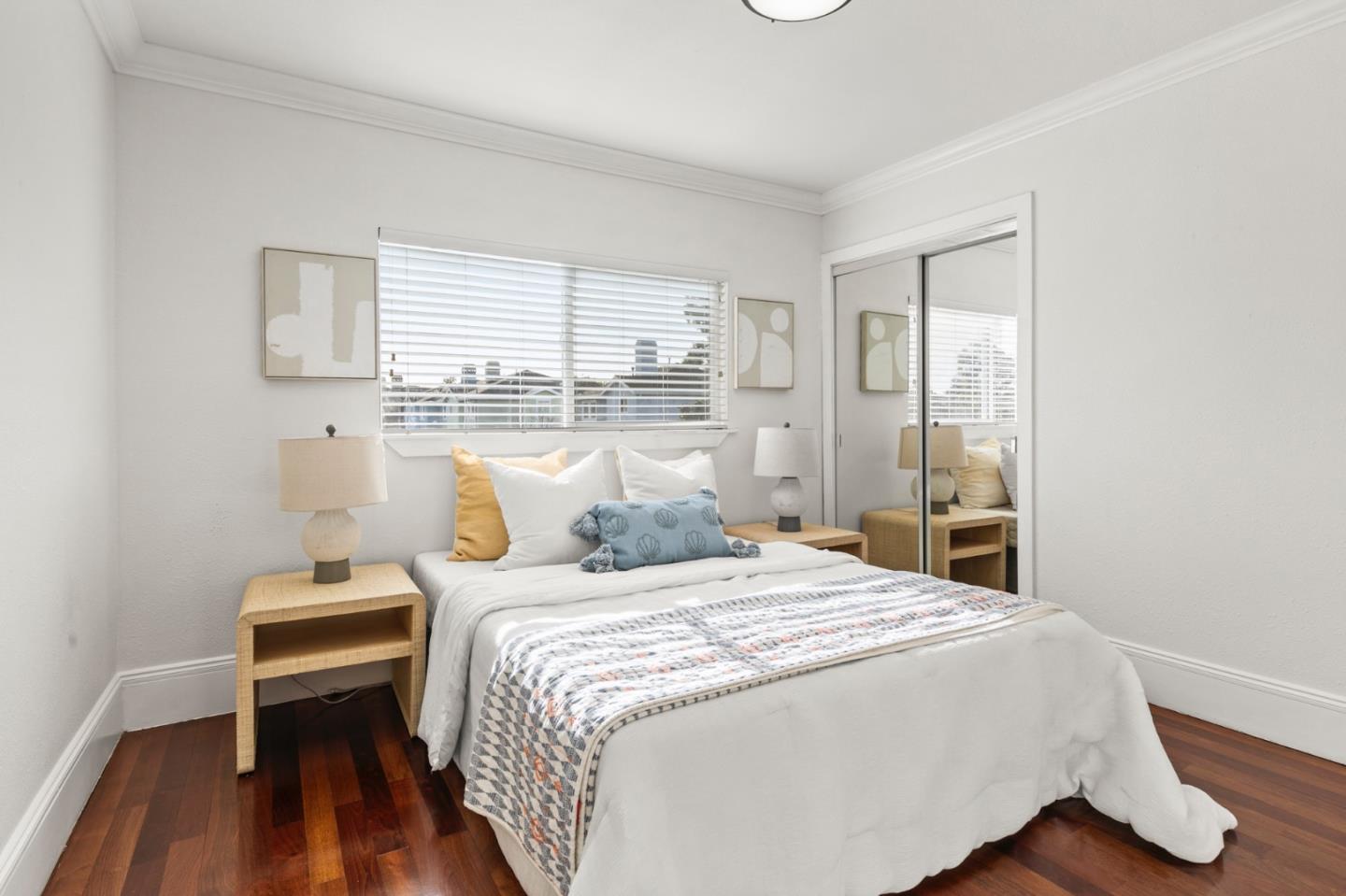 1095 Wright Avenue Mountain View, CA 94043 - Photo 20 of 29 a bedroom with a bed and wooden floor