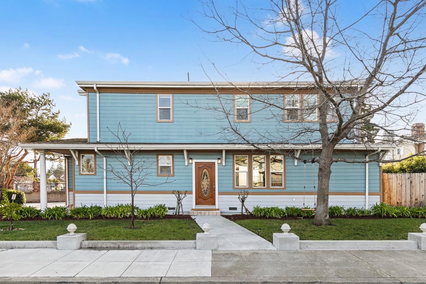 1095 Wright Avenue Mountain View, CA 94043 - Photo 2 of 29 a front view of a house with a yard