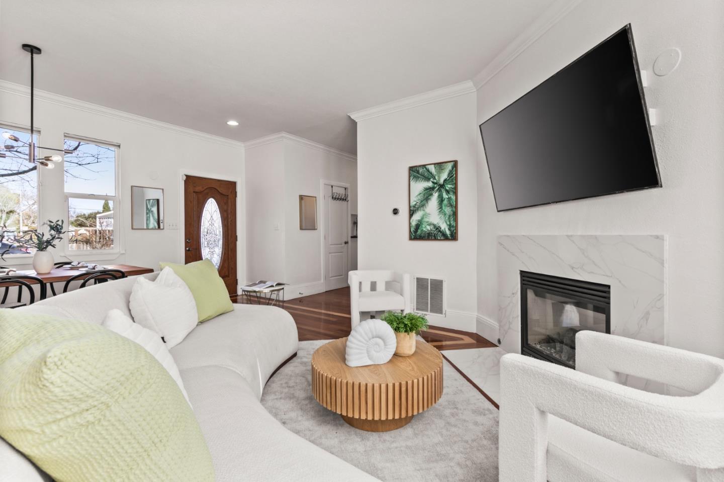 1095 Wright Avenue Mountain View, CA 94043 - Photo 7 of 29 a living room with furniture a flat screen tv and a fireplace