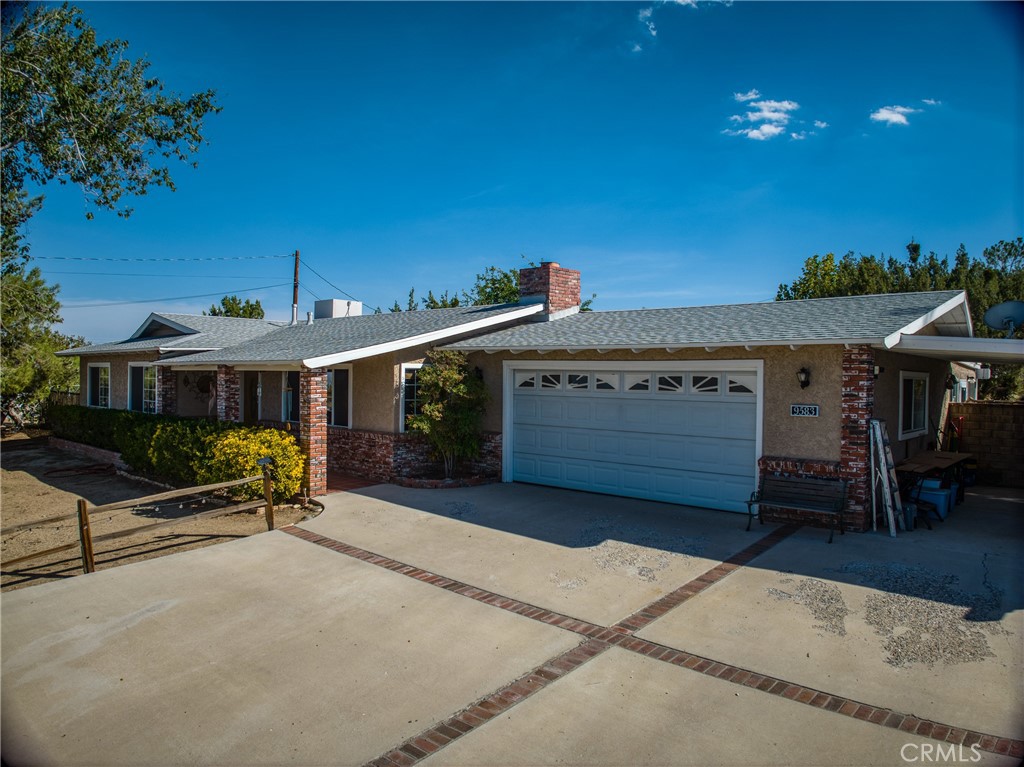 9583 Mountain Road Pinon Hills, CA 92372 - Photo 1 of 1 a view of a house with a patio
