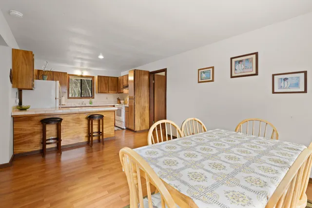 a view of living room with furniture and window