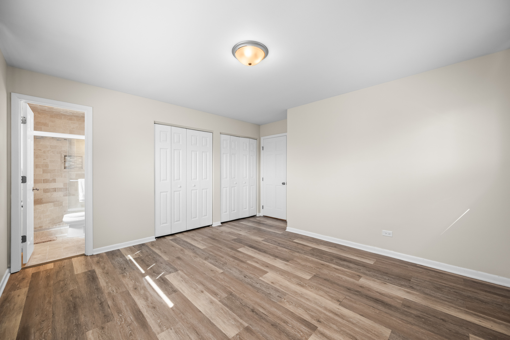 1917 Pawnee Lane Mount Prospect, IL 60056 - Photo 11 of 29 a view of empty room with wooden floor