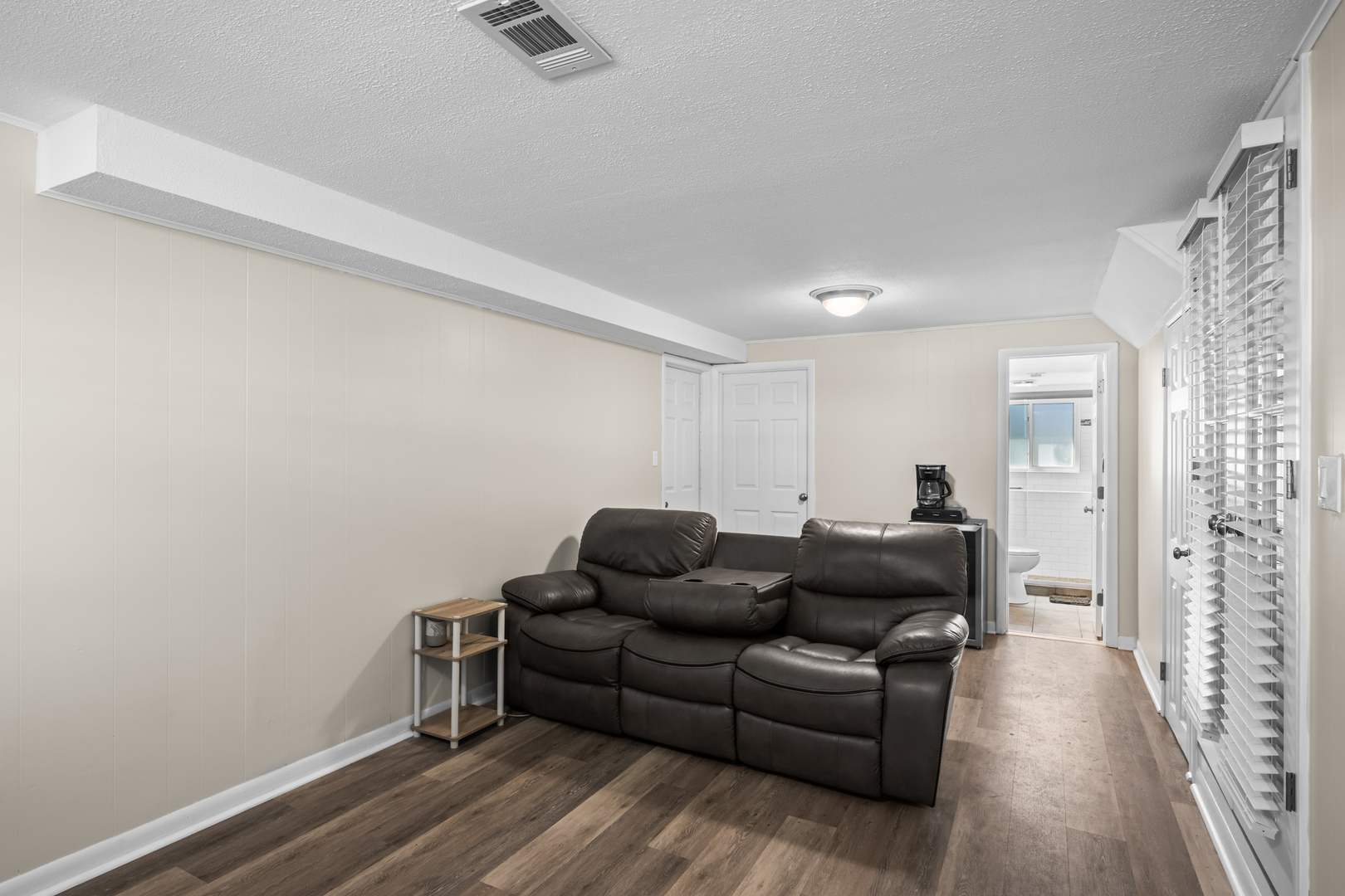 1917 Pawnee Lane Mount Prospect, IL 60056 - Photo 17 of 29 a living room with furniture and a wooden floor