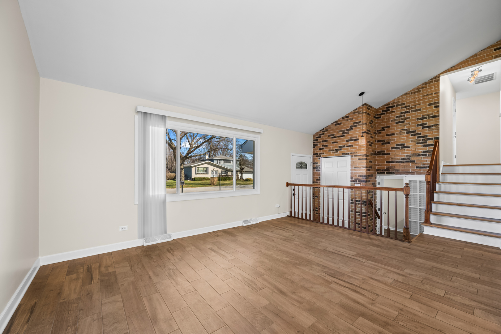 1917 Pawnee Lane Mount Prospect, IL 60056 - Photo 3 of 29 a view of livingroom with furniture and wooden floor
