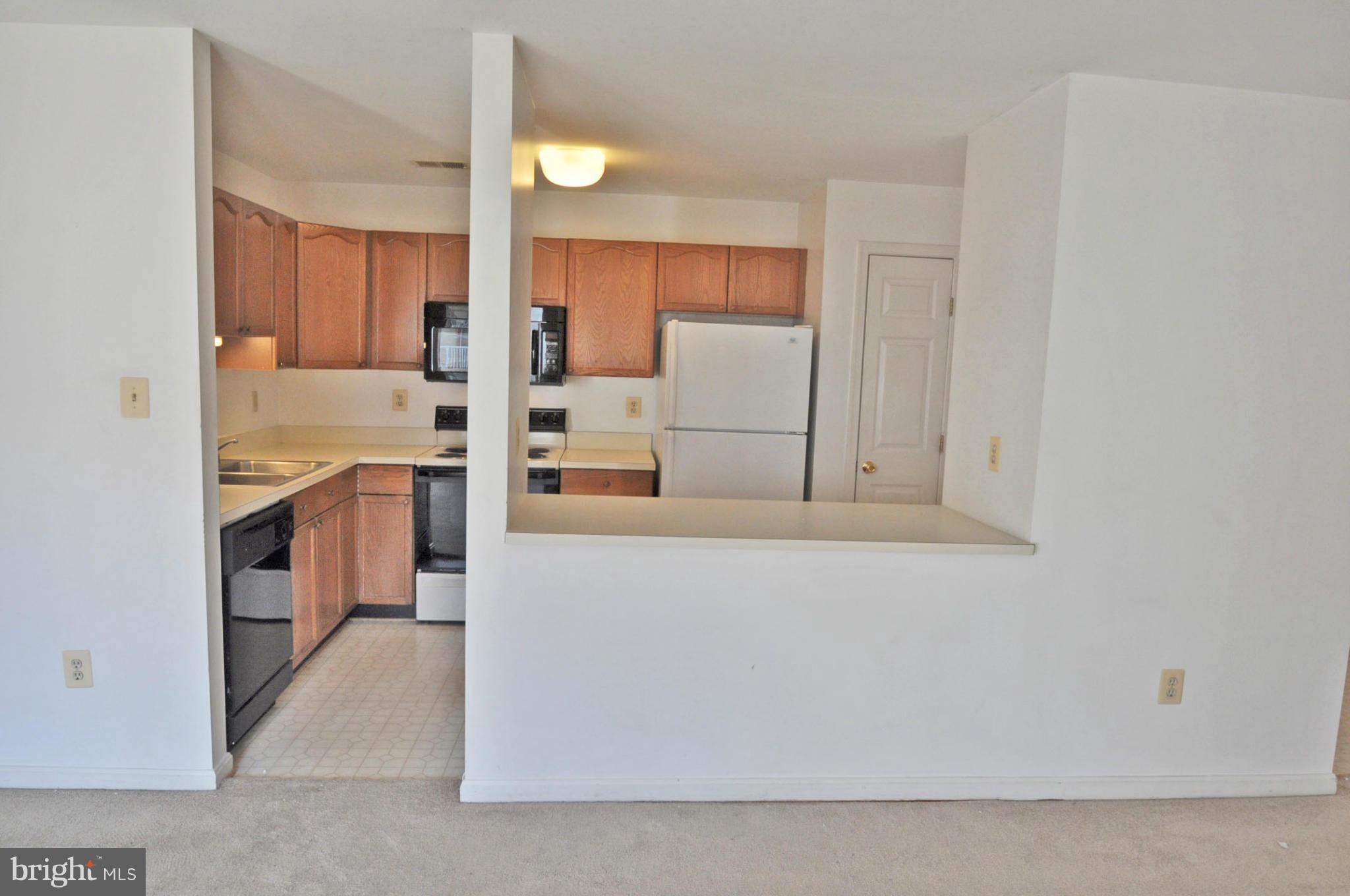 2104 Whitehall Road, Unit 1C Frederick, MD 21702 - Photo 21 of 24 View from dining room towards kitchen
