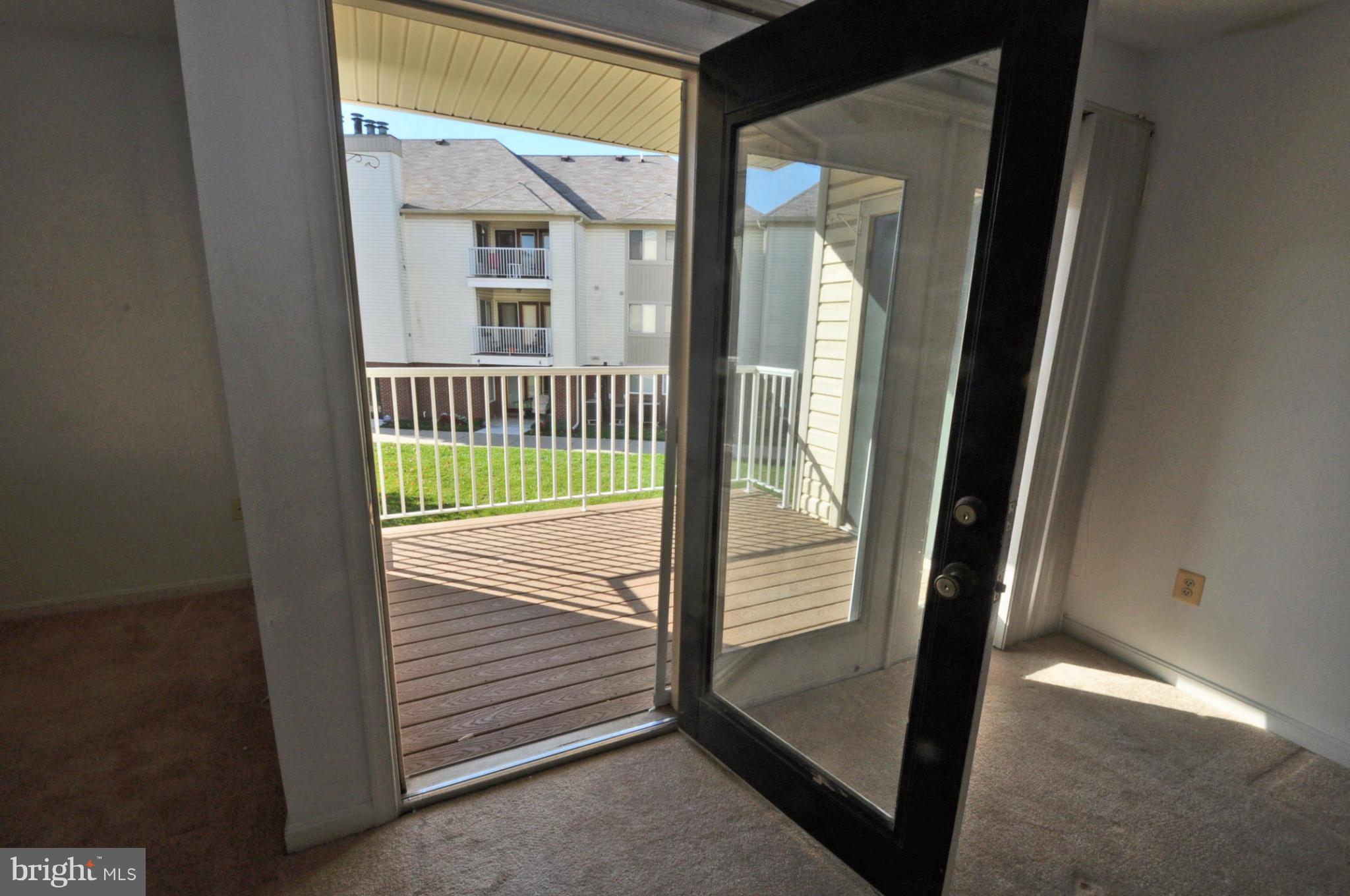 2104 Whitehall Road, Unit 1C Frederick, MD 21702 - Photo 9 of 24 French door to covered deck