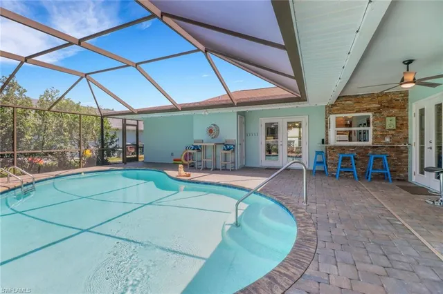 a room with lots of table and chairs