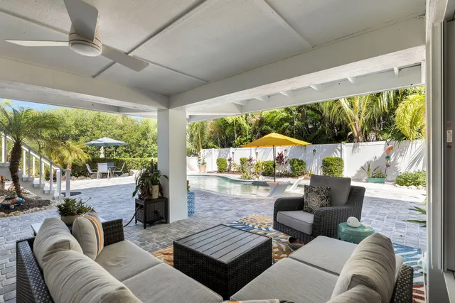 a view of a balcony with chairs