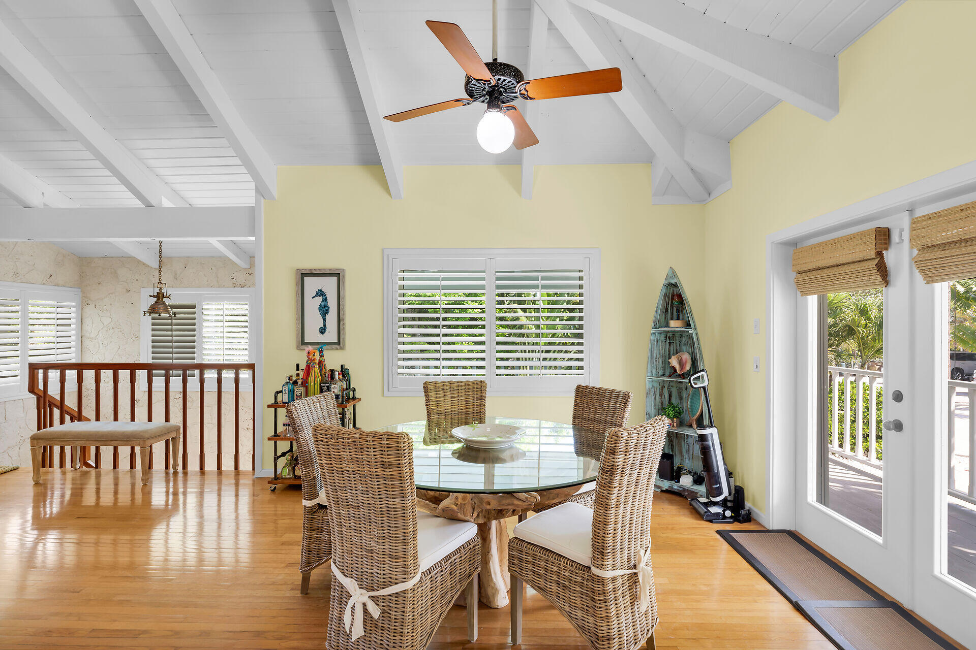 835 70th Street, Unit GULF Marathon, FL 33050 - Photo 20 of 46 a dining room with furniture a chandelier and wooden floor