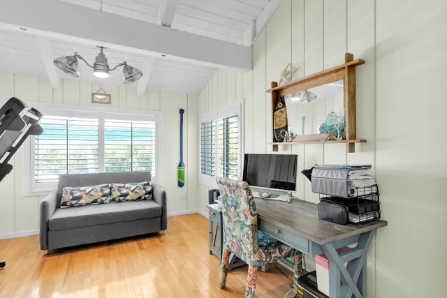 a view of room with furniture and large window