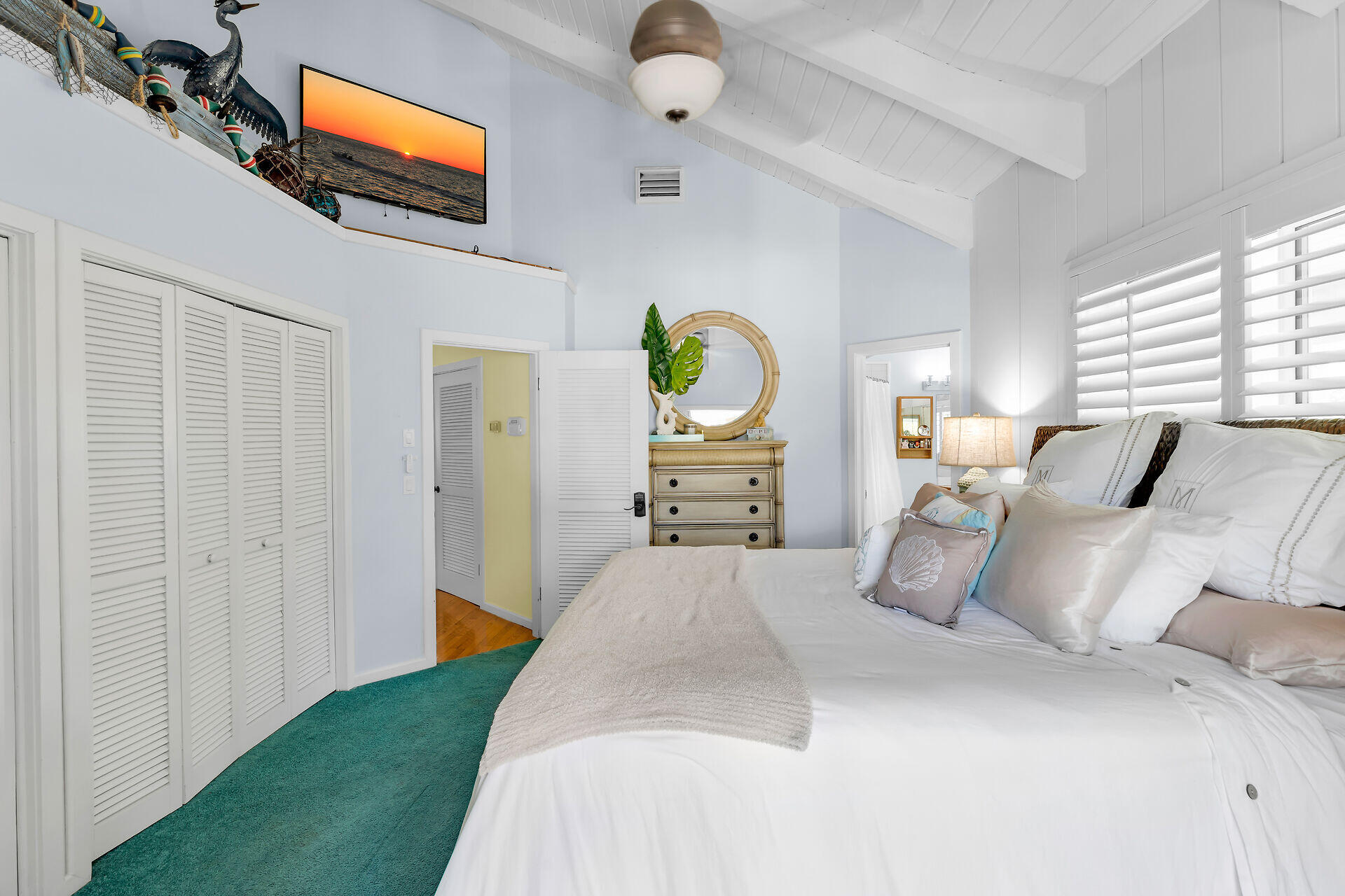 835 70th Street, Unit GULF Marathon, FL 33050 - Photo 29 of 46 a bedroom with bed and a window