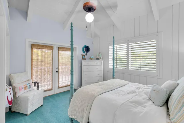 a view of a balcony with furniture