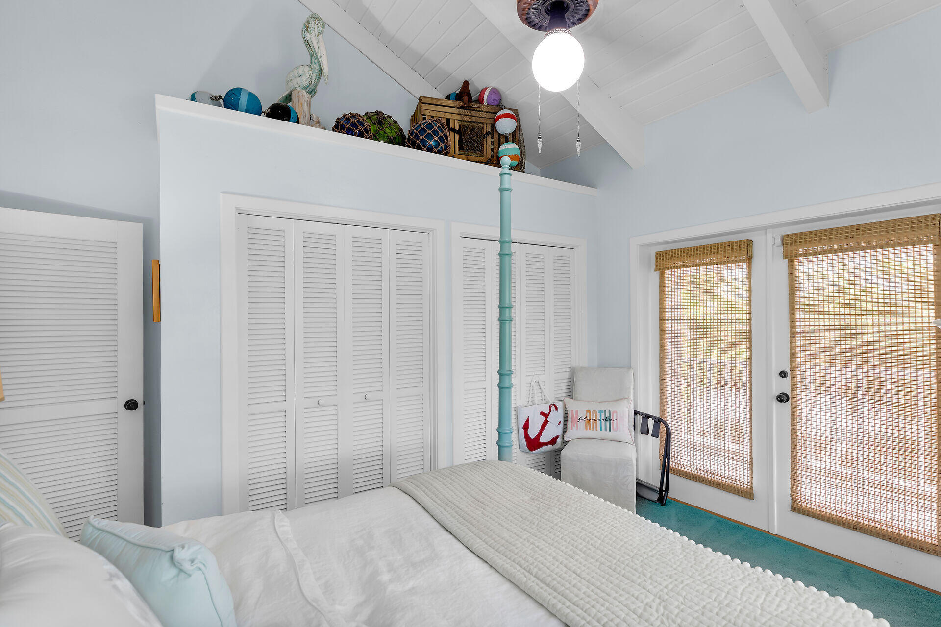 835 70th Street, Unit GULF Marathon, FL 33050 - Photo 36 of 46 a bedroom with a bed and a window