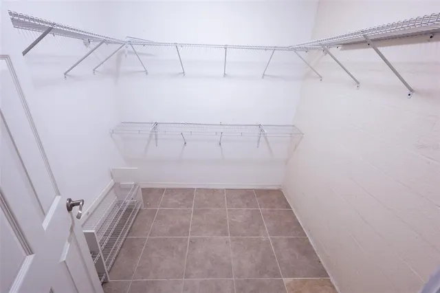 a view of a room with racks on the wall