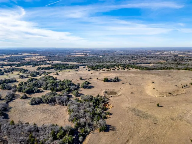 an aerial view of beach and city