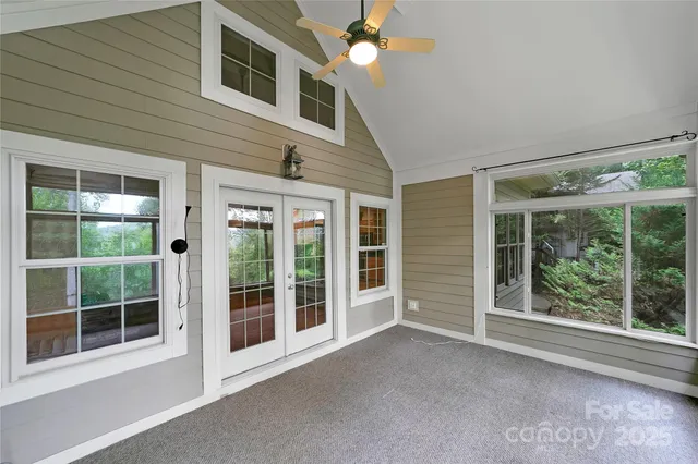 a view of a house with a large window