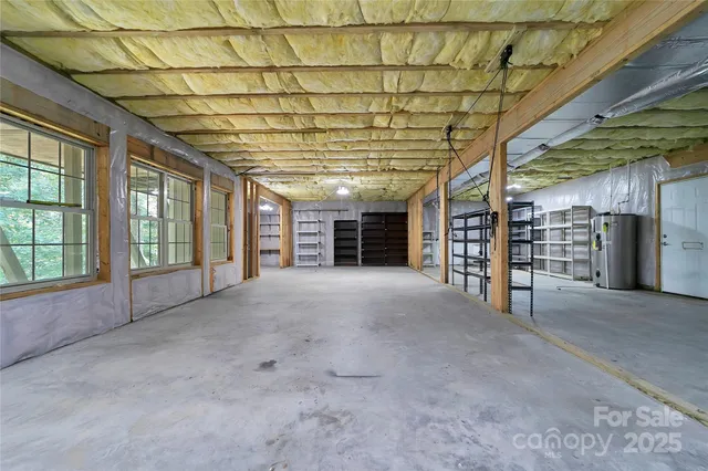 a view of a house with a yard and porch