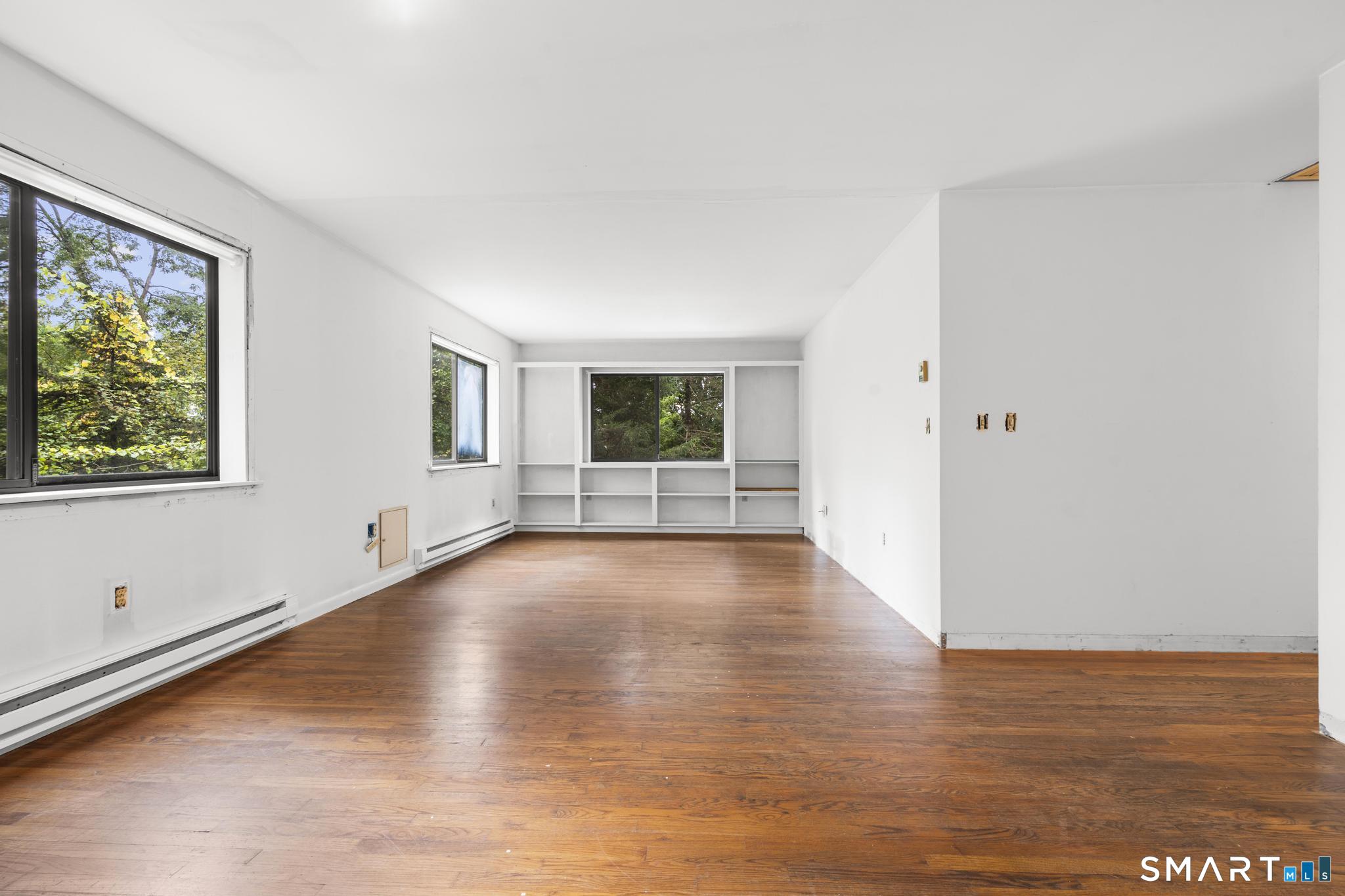 292 Branch Road Thomaston, CT 06787 - Photo 29 of 32 Upper level LR / DR space in need of trim to finish space. Could be in-law space, rental endless possibilities.