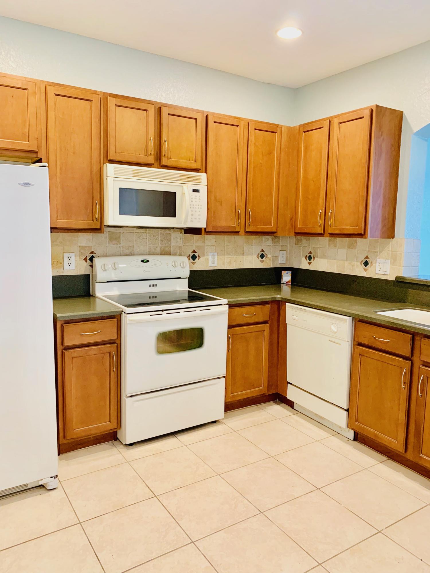 2043 Oakhurst Way Riviera Beach, FL 33404 - Photo 31 of 52 KITCHEN