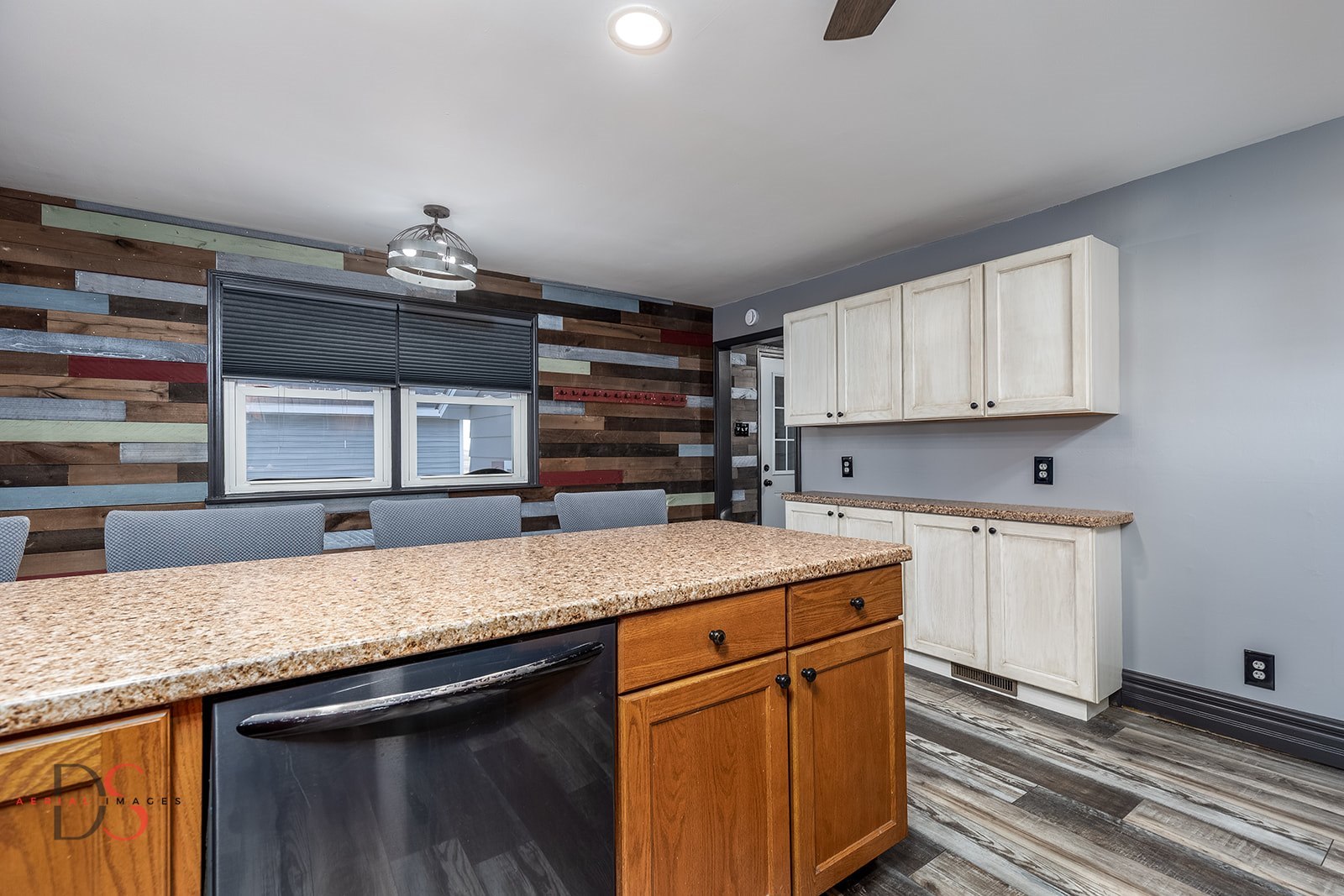 4775 West Dupont Road Morris, IL 60450 - Photo 13 of 24 a kitchen with granite countertop a sink and cabinets