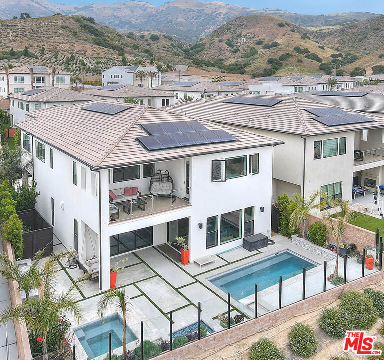 20558 Overlook Court Porter Ranch, CA 91326 - Photo 43 of 48 an aerial view of multiple houses with a yard