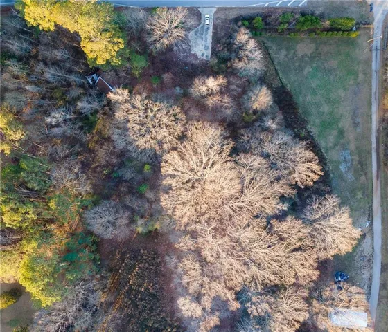 a view of balcony with wooden floor