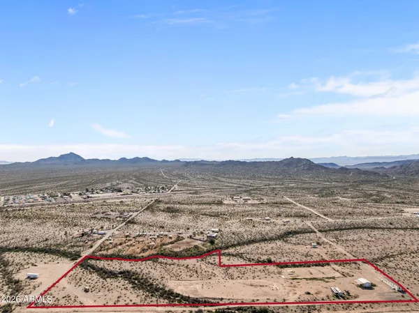a view of an ocean from a mountain