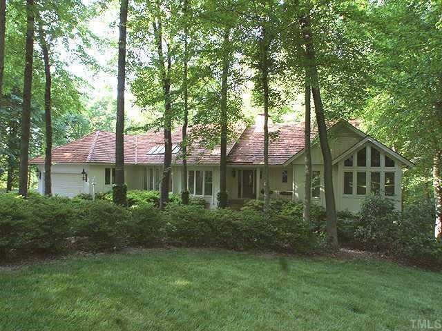 front view of a house with a garden