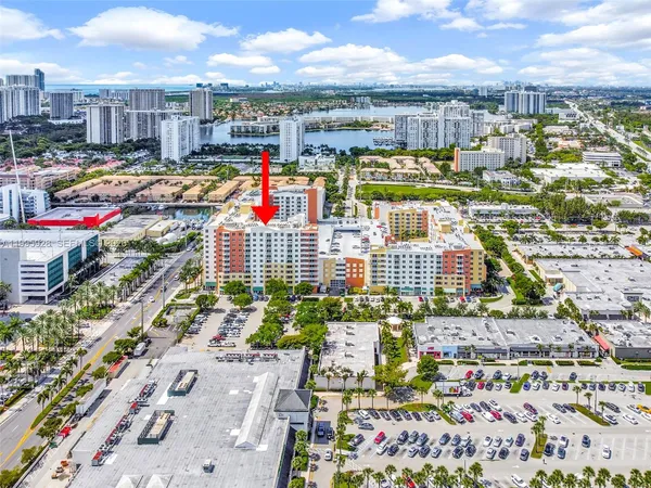 a bedroom with bed and a night stand