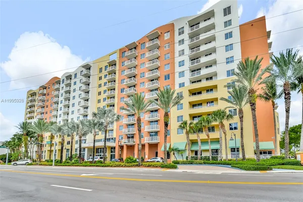 a bathroom with a shower a toilet and sink