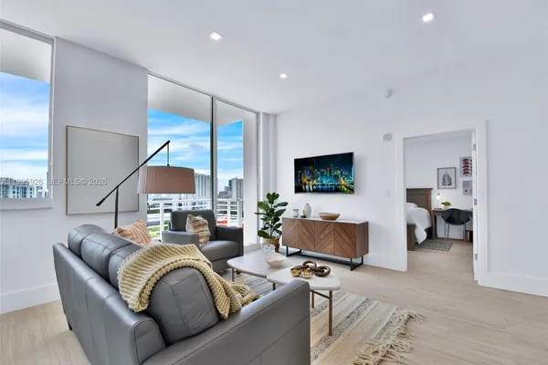 a living room with furniture and a couch