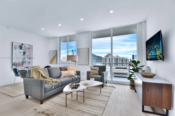 a workspace with furniture and window