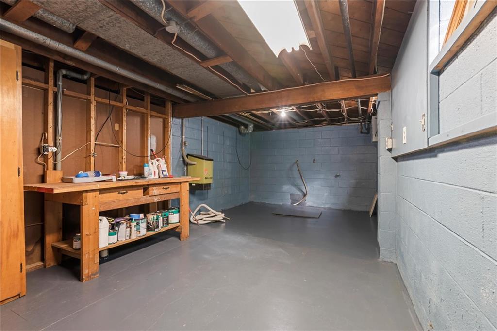 865 Wheatland Road West Middlesex, PA 16159 - Photo 18 of 24 a view of an empty room with a fireplace