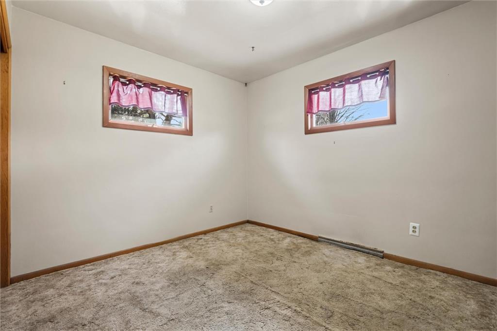 865 Wheatland Road West Middlesex, PA 16159 - Photo 8 of 24 a view of an empty room with a painting on the wall