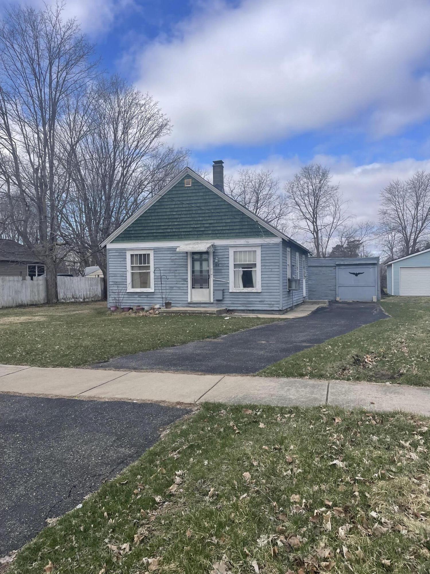 166 South Pleasant Street Lowell, MI 49331 - Photo 1 of 19 IMG_8369