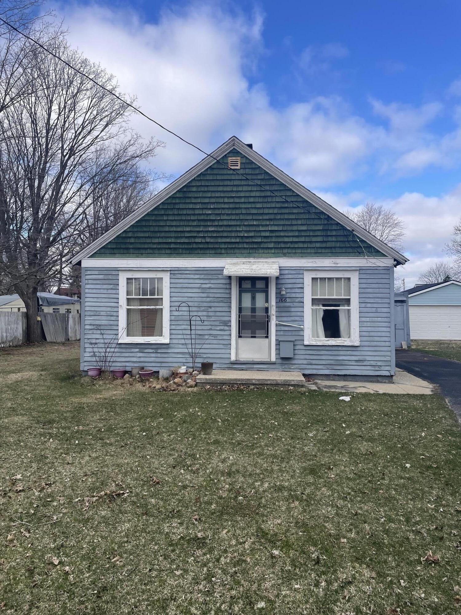 166 South Pleasant Street Lowell, MI 49331 - Photo 2 of 19 IMG_8370
