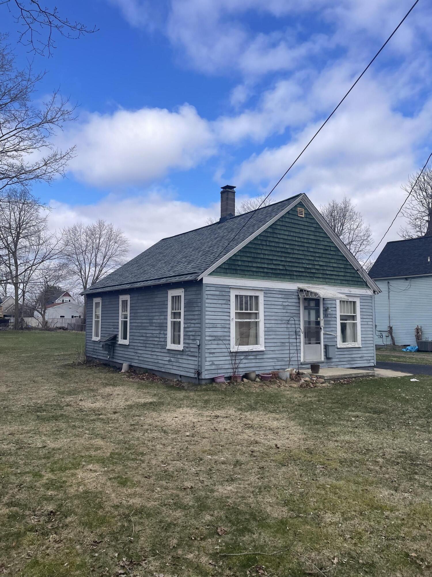 166 South Pleasant Street Lowell, MI 49331 - Photo 3 of 19 IMG_8371