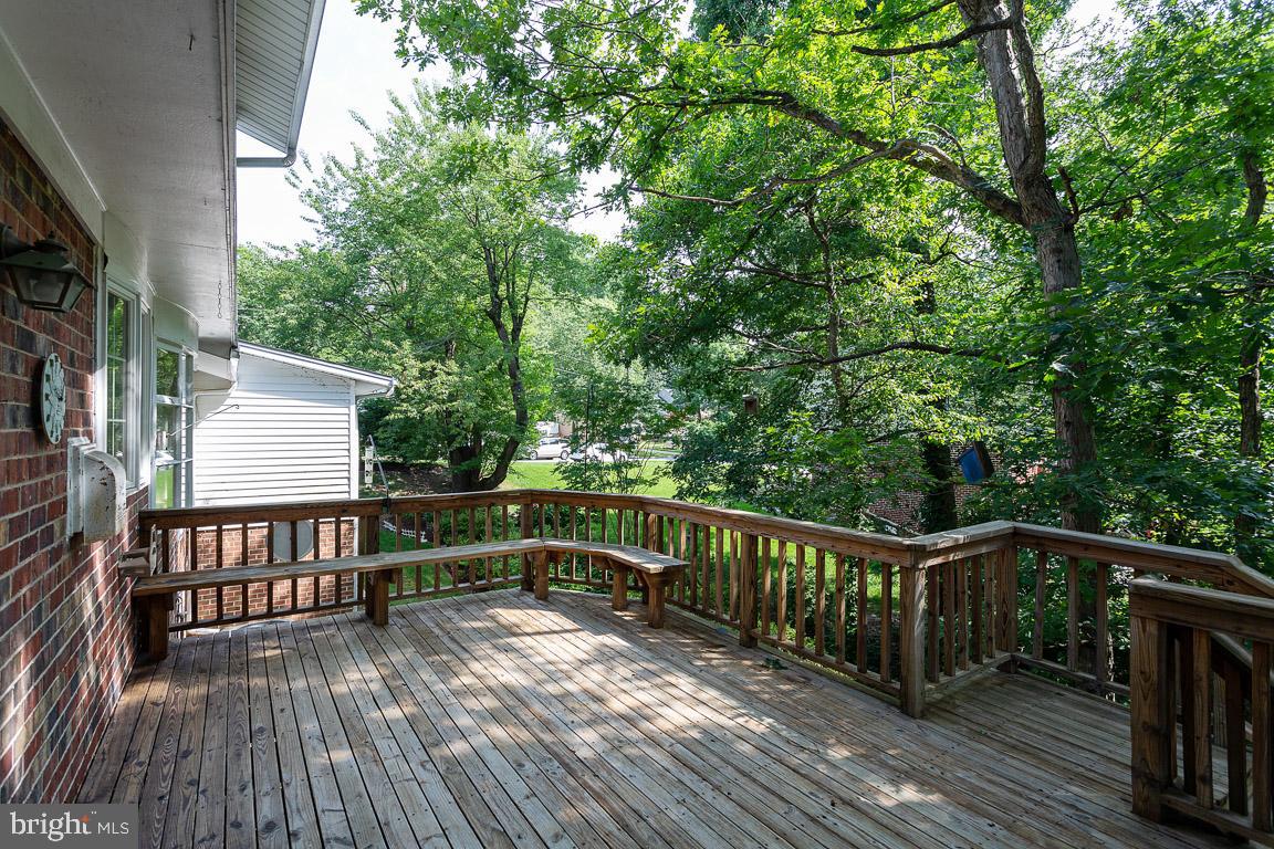 6811 Brisbane Street Springfield, VA 22152 - Photo 12 of 22 Large deck with built in seating