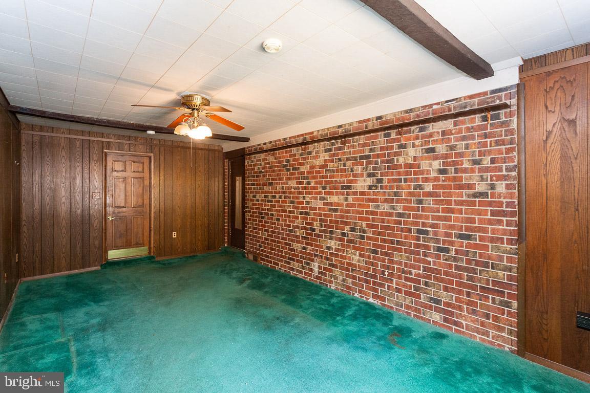 6811 Brisbane Street Springfield, VA 22152 - Photo 15 of 22 Convert to den or 5th bedroom! Access to garage.