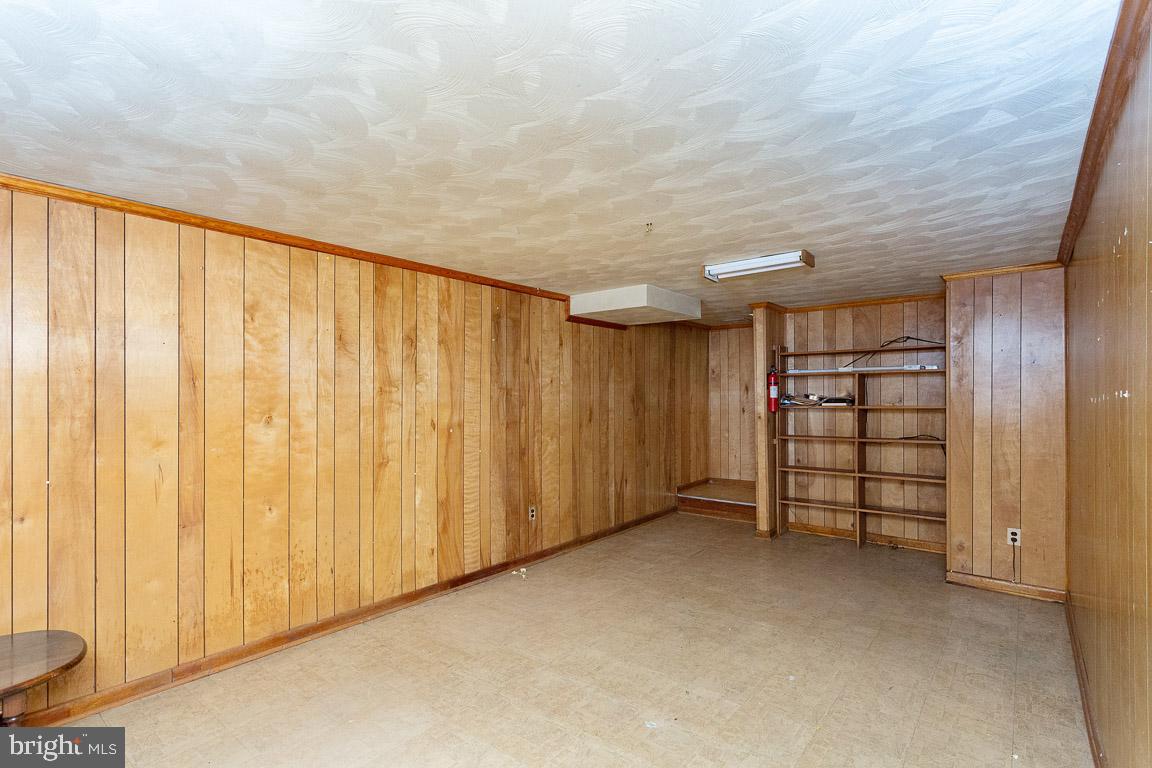 6811 Brisbane Street Springfield, VA 22152 - Photo 21 of 22 Full basement - with built in shelves.