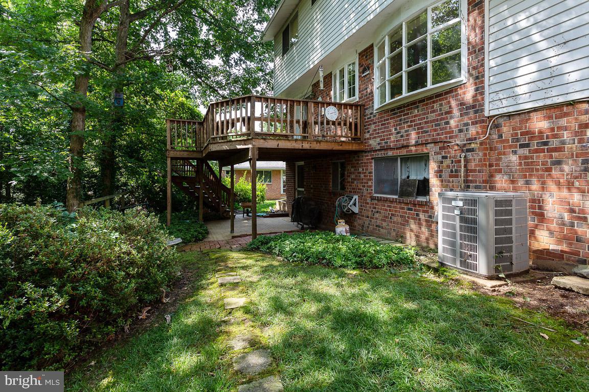 6811 Brisbane Street Springfield, VA 22152 - Photo 22 of 22 Private backyard with built in shed.