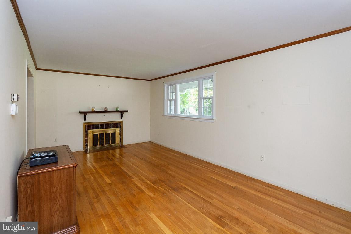6811 Brisbane Street Springfield, VA 22152 - Photo 4 of 22 Living Room with gas fireplace