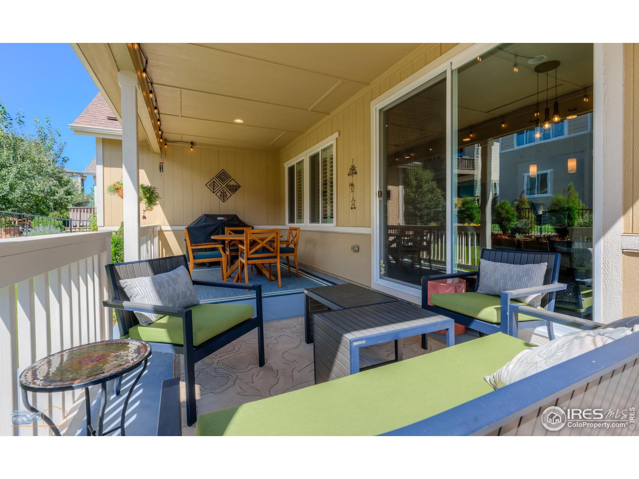 12908 Sandstone Drive Broomfield, CO 80021 - Photo 13 of 39 a view of a patio with table and chairs