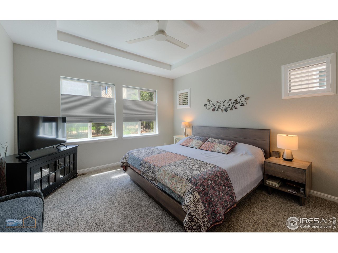 12908 Sandstone Drive Broomfield, CO 80021 - Photo 15 of 39 a bedroom with a bed and a cabinets