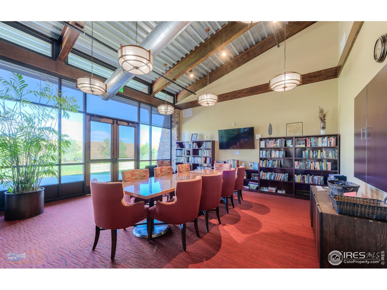 12908 Sandstone Drive Broomfield, CO 80021 - Photo 32 of 39 a view of a dining room with furniture window and outside view