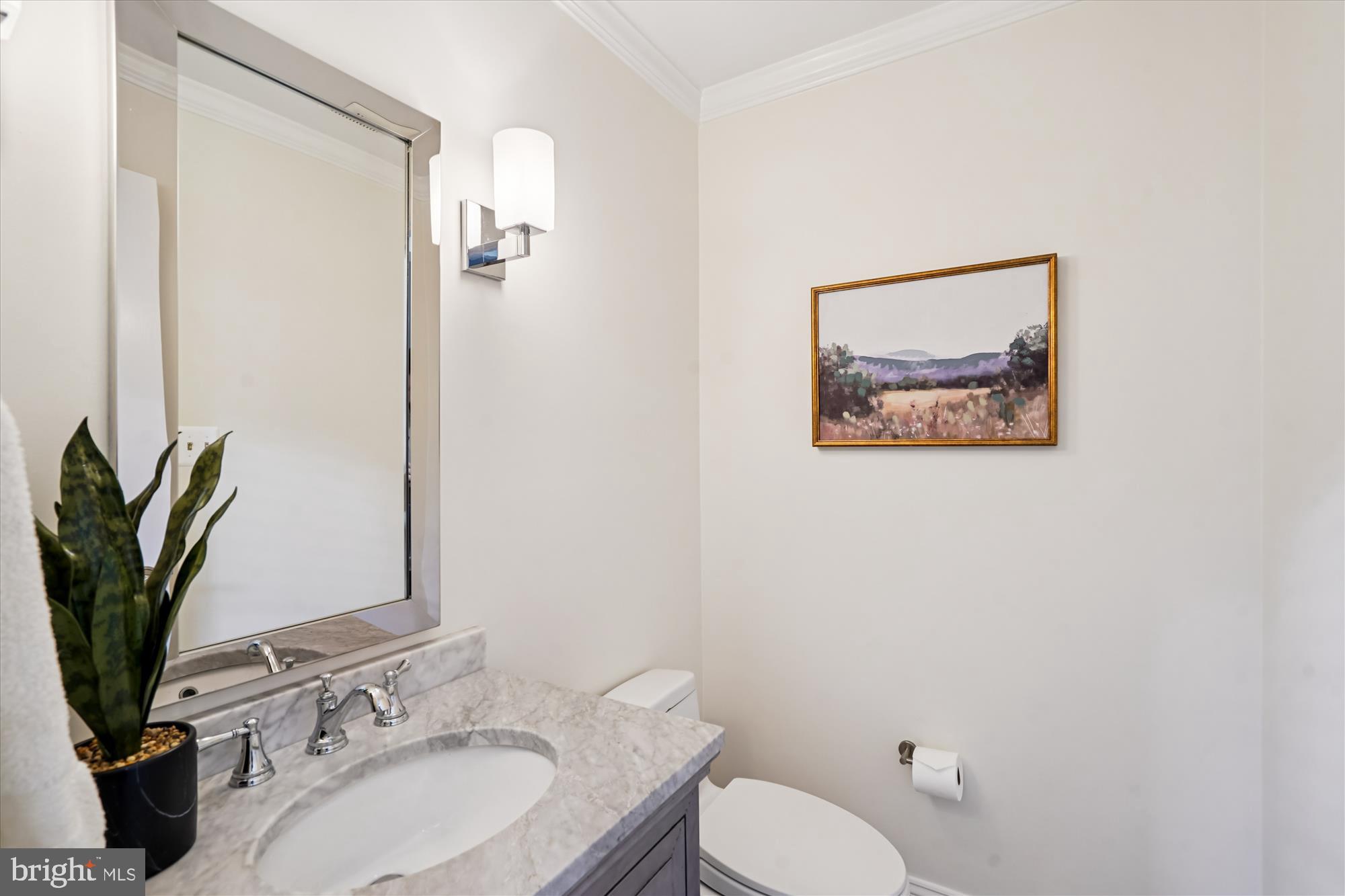 7252 Evans Mill Road McLean, VA 22101 - Photo 15 of 89 a bathroom with a granite countertop sink and a mirror