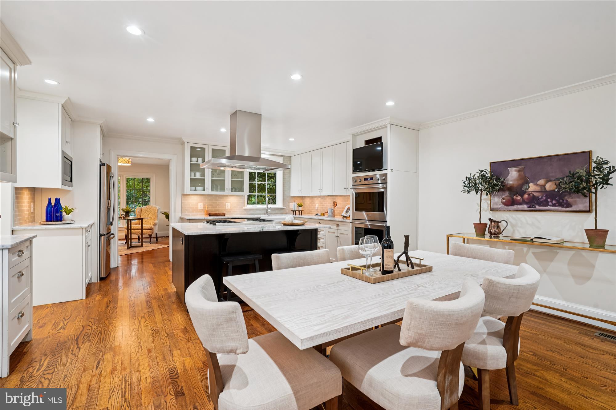 7252 Evans Mill Road McLean, VA 22101 - Photo 19 of 89 a kitchen with a table and chairs in it