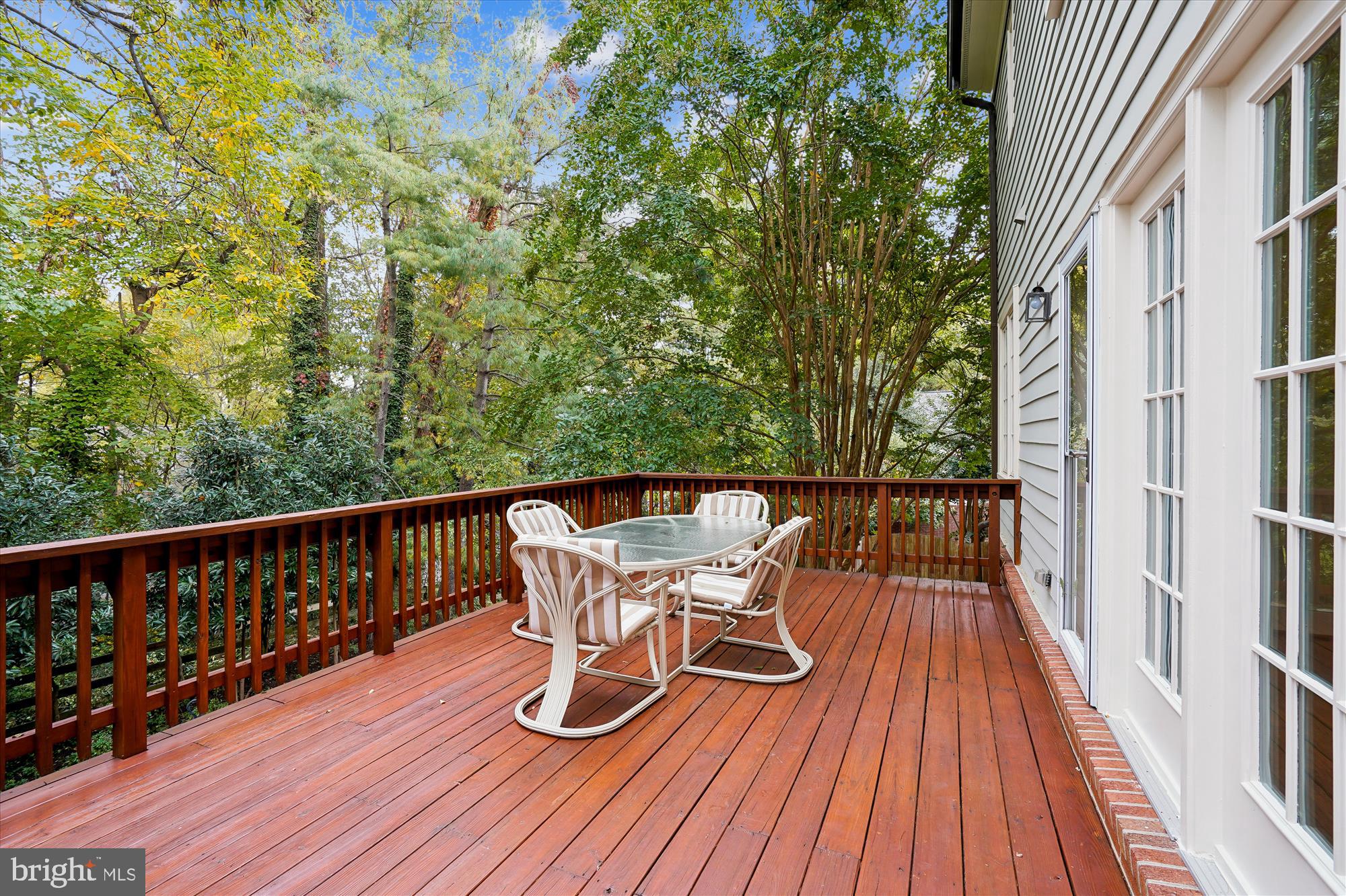 7252 Evans Mill Road McLean, VA 22101 - Photo 24 of 89 a balcony with wooden floor and outdoor seating