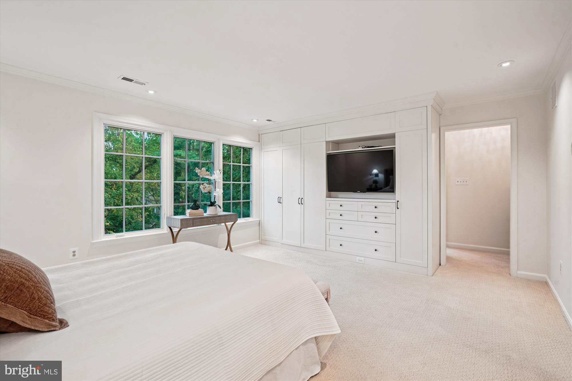 7252 Evans Mill Road McLean, VA 22101 - Photo 27 of 89 a view of a bedroom with furniture and flat screen tv