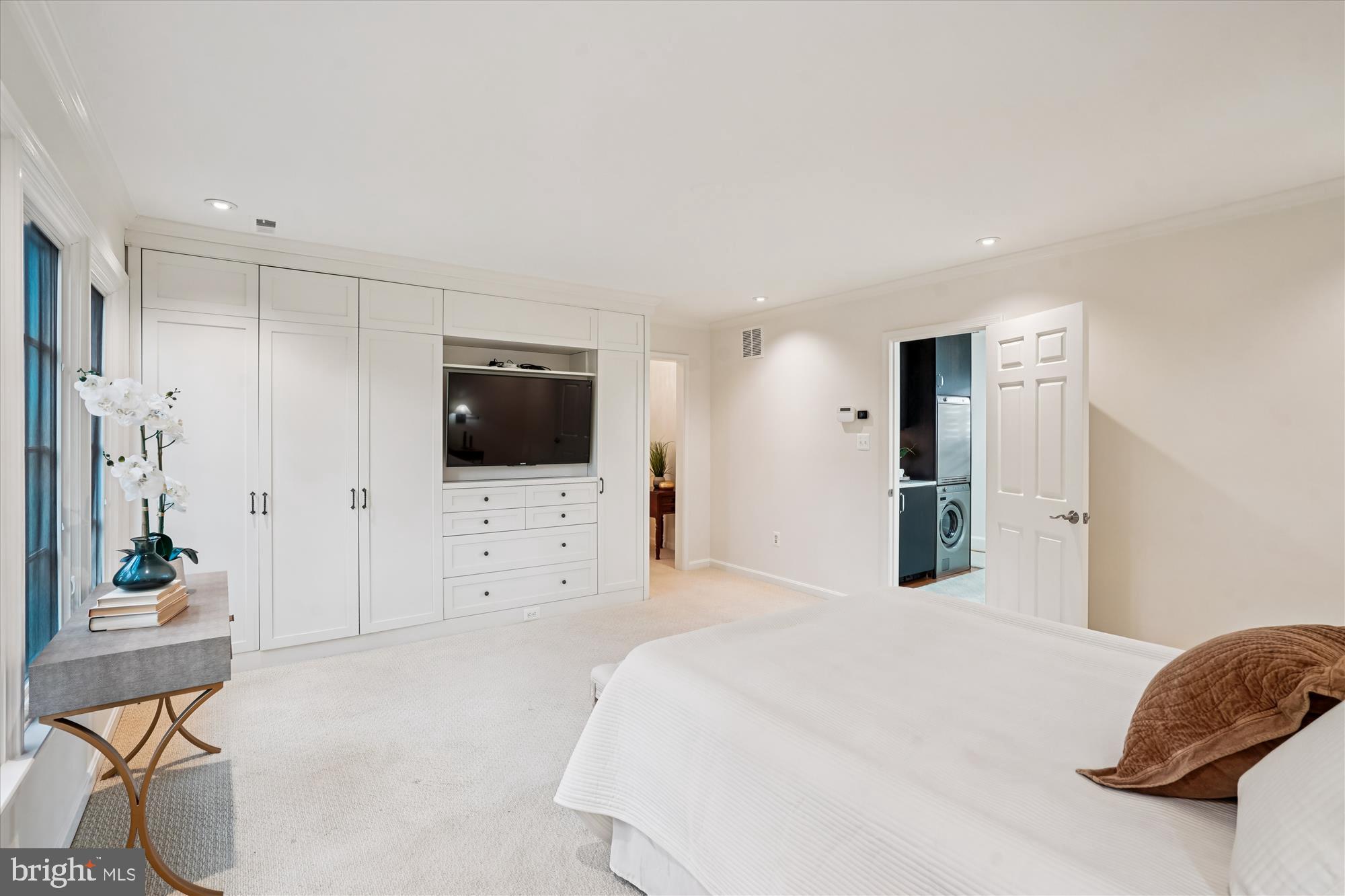 7252 Evans Mill Road McLean, VA 22101 - Photo 29 of 89 a bedroom with a bed and a flat screen tv